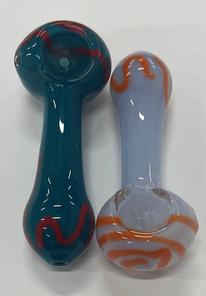 Two hand-blown glass pipes from the TOKE It Up accessories shelf
