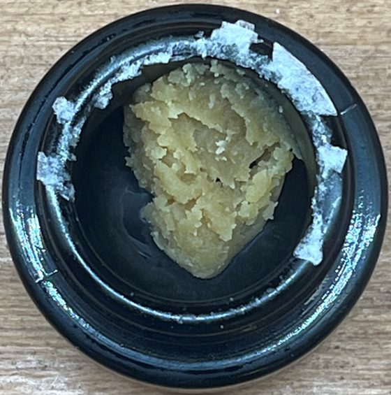 A jar of hash rosin from the TOKE It Up menu, seen from above